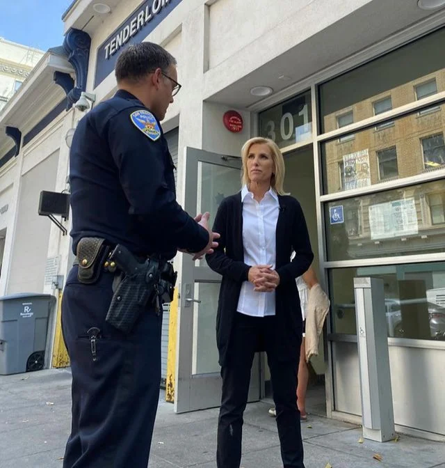 Laura Ingraham and a police man